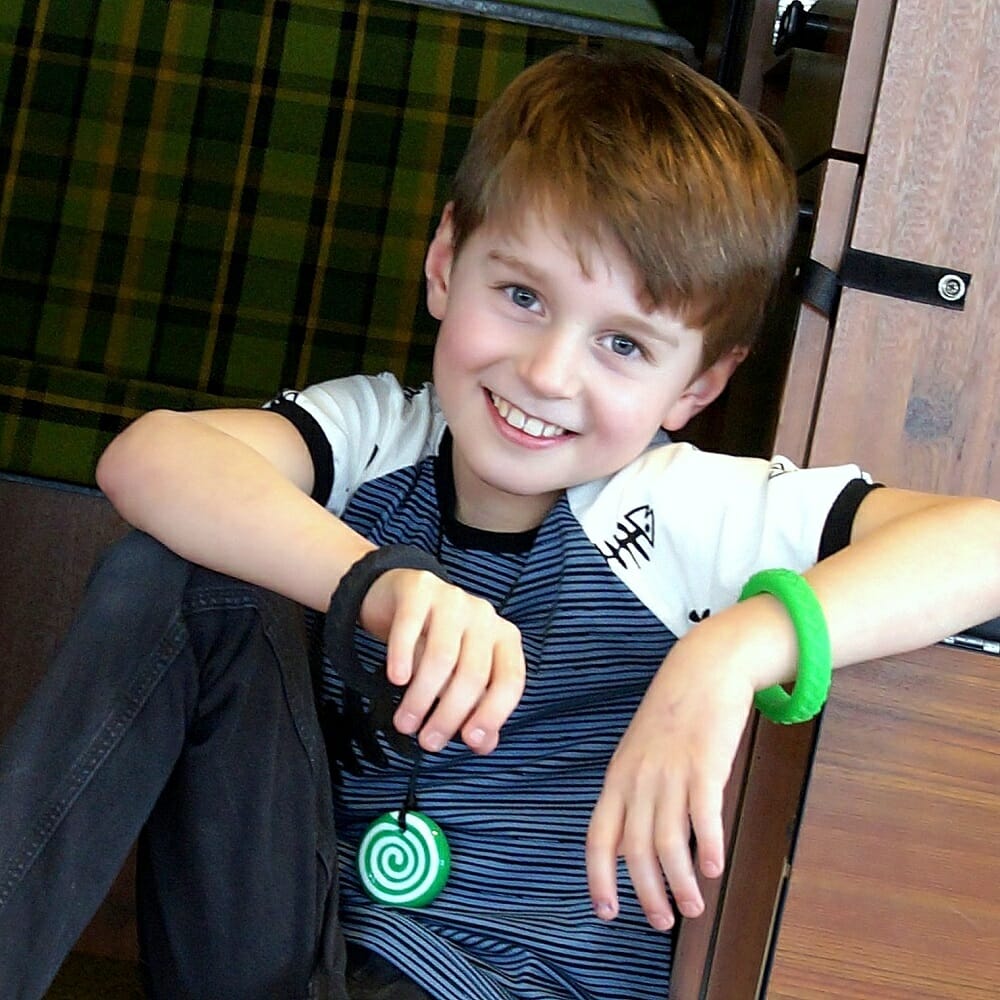 Chewigem Button is a fun chew chain for boys and girls.