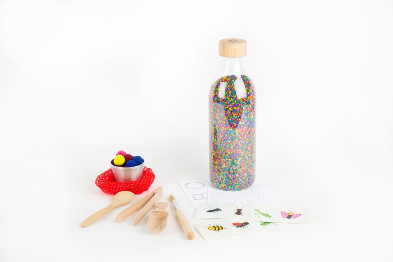 petit boum sensory bottle with sensory rice comes with props and game proposals for endless sensory play moments with your child together