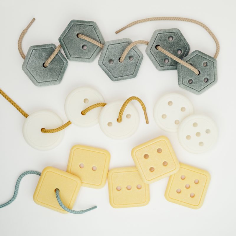 Stringing with Stones is a fun set for practicing yellow door's fine motor skills.