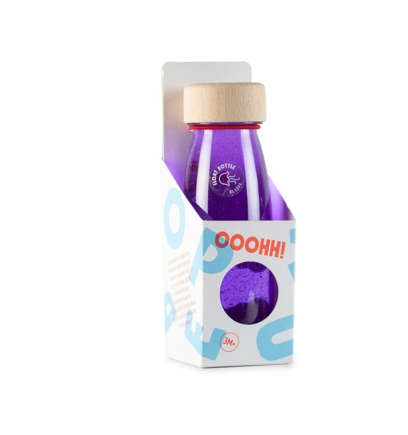 petit boum float bottle is a sensory bottle filled with liquid, glitter and pompom. They challenge children to discover and play sensory