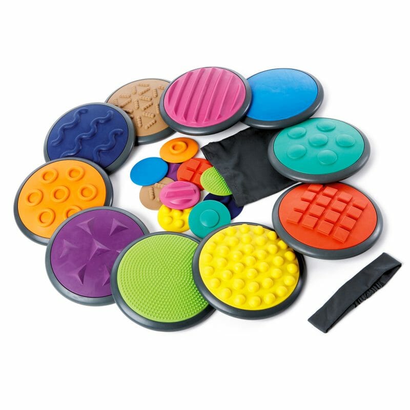Chige's tactile discs are inviting material to challenge children's sense of touch. Playfully practicing tactile discrimination.