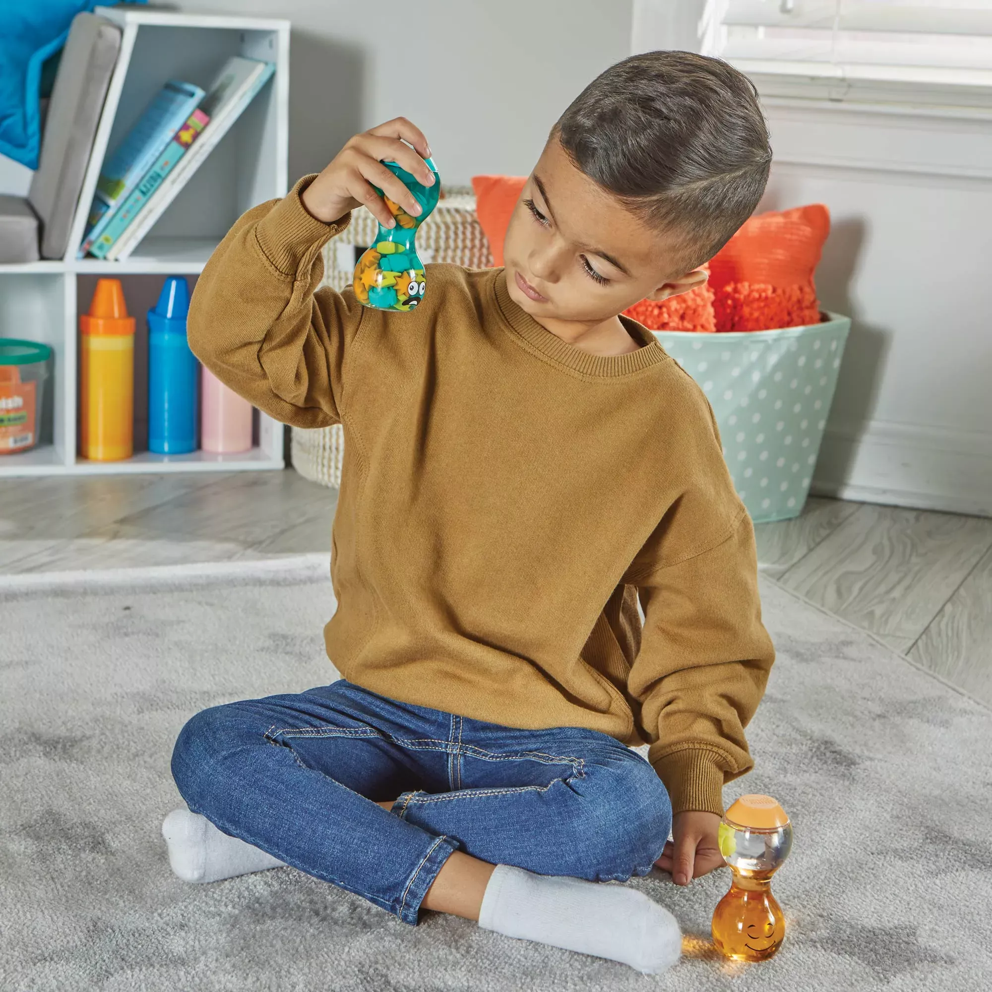These 2 sensory bottles from hand2mind introduce children to the feeling of calm and overwhelm.