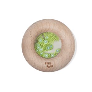 The petit boum wooden sensory donut is a great sensory toy to explore visually, tactilely, and auditorily