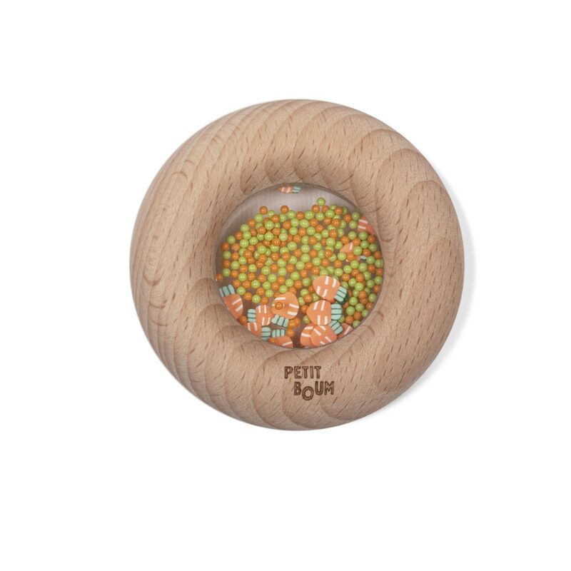 The sensory donut from Petit Boum is beautiful. The wooden donut is durable and suitable for young children and children with disabilities. 