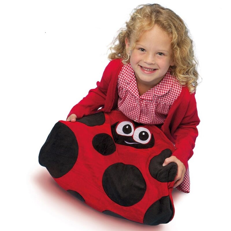 The weighted pillow ladybug helps sensitive children to calm down and relax.