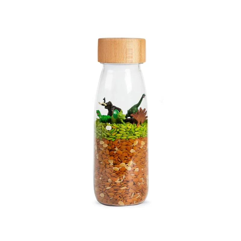 The Petit Boum sensory bottle Jurassic stimulates the imagination with realistic dinosaurs. Ideal for playful learning and soothing discoveries. 
