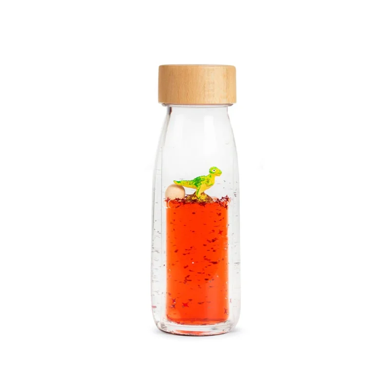 Discover the Move Bottle T-Rex from Petit Boum – a unique sensory bottle with a floating dinosaur.