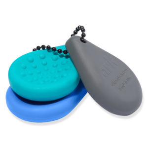 Compact keychain fidget with different textures for sensory support for autism, ADHD and stimulus processing. Discreet and practical.