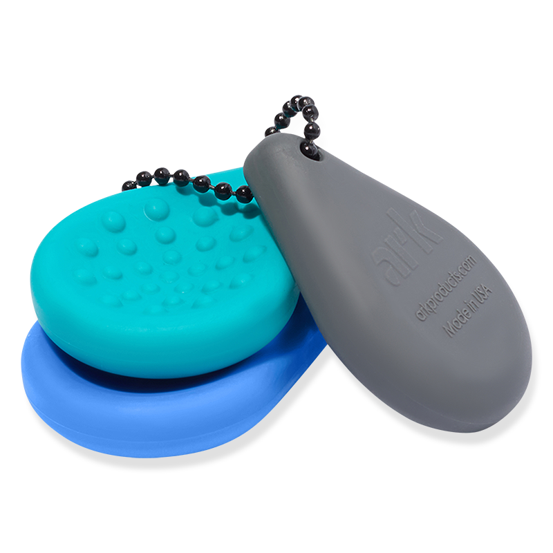 Compacte sleutelhanger fidget met verschillende texturen voor sensorische ondersteuning bij autisme, ADHD en prikkelverwerking. Discreet en praktisch.